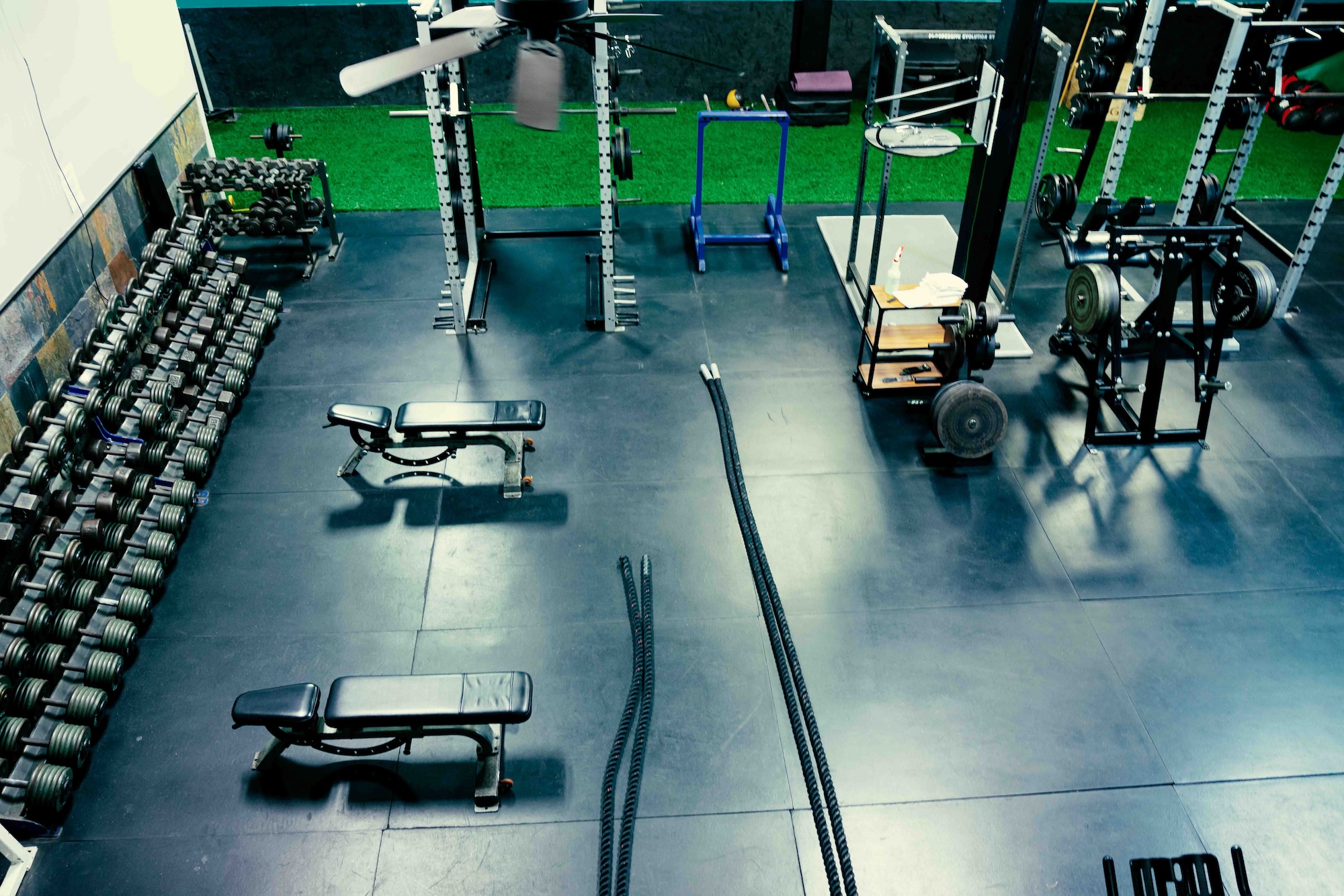 Functional Workout area with battle ropes and dumbbells